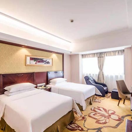 Vienna International Hotel Shanghai Pudong Xiupu Road Exterior photo